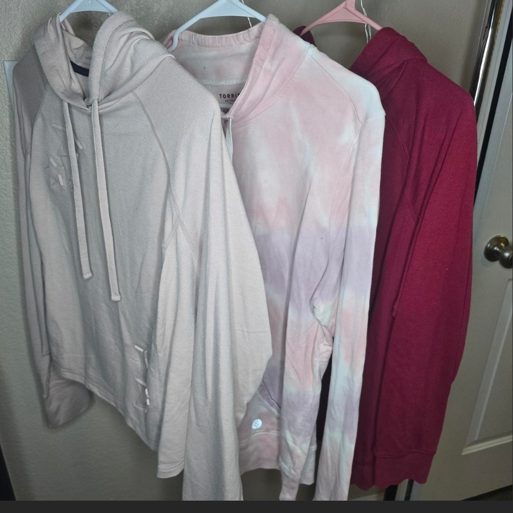 3 Torrid Hoodies in Cream, Tie-Dye, and Red
